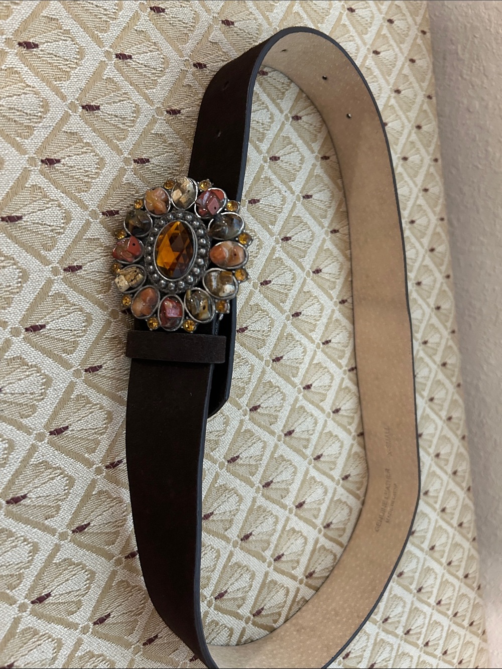 Harold’s brown suede belt